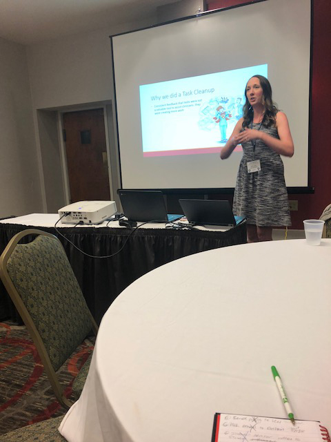 Woman presenting at conference